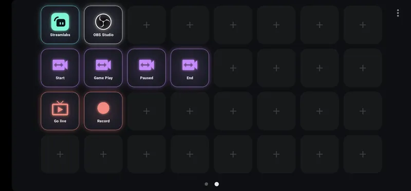 DeckPad on a phone held sideways: glowing keys for Streamlabs, OBS Studio, the scenes Start, Game Play, Paused and End, Go live and Record